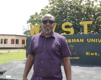 Dr Olu Q. Menjay President of Tubman University
